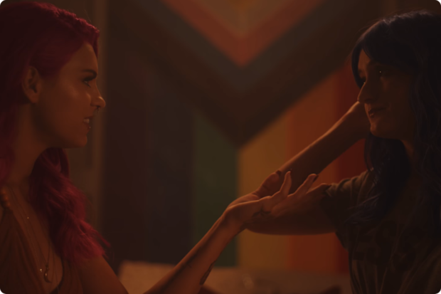 The ad features two young women in an innuendo-laden situation.