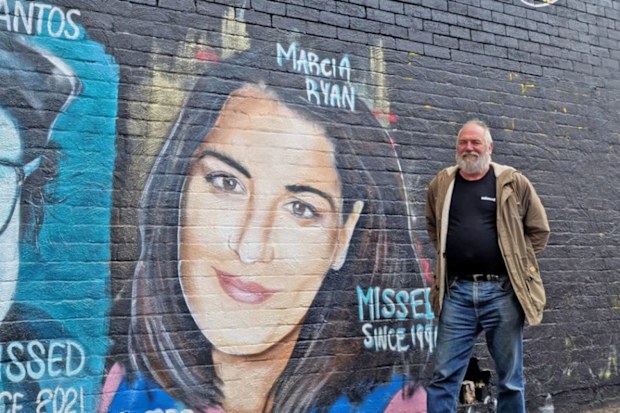 Tony pictured with a mural of Marcia in Melbourne.