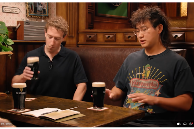 Mark Zuckerberg taking a sip of Guinness for the first time. 