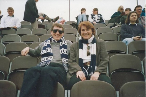 Tony Ryan pictured with his sister Marcia at an AFL match before her disappearance.