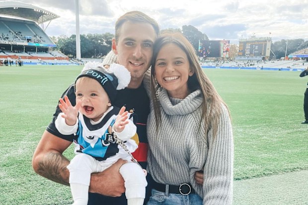 AFL star Jeremy Finlayson, partner Kellie Gardner and their daughter Sophia.