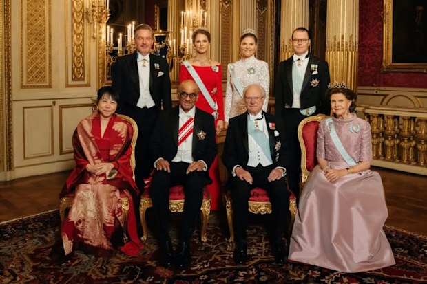 State banquet at Stockholm Palace, Sweden with King Carl XVI Gustaf and Queen Silvia hosting Singapore’s President Tharman Shanmugaratnam and his wife Jane Ittogi. Christopher O’Neill, Princess Madeleine, Crown Princess Victoria and Prince Daniel are seen standing L-R in the back row.