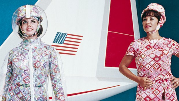 Hostesses model 1960s Pucci uniforms in front of Lockheed’s supersonic transport full-size mockup.