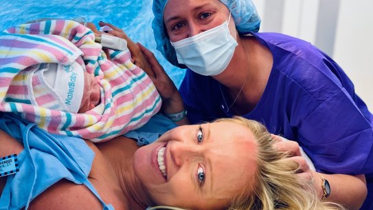 Baby Angus, his intended mother Edwina Peach, and his surrogate mother Jennifer McCloy moments after Angus’ birth in November 2022. The two women are campaigning for change to make surrogacy more accessible in Australia.
