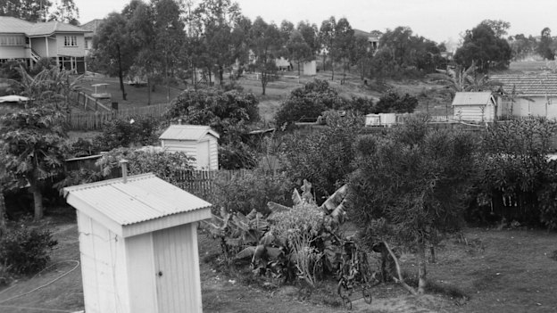 Suburban properties with outhouses, a key function of backyards