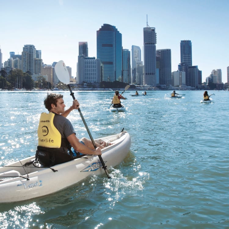 The Riverlife armada setting paddle down the Brisbane River.