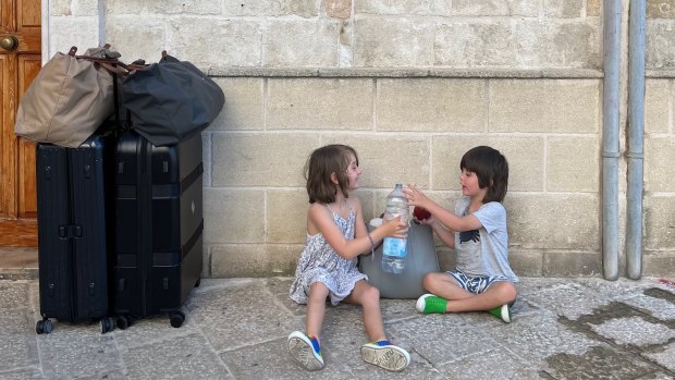 Edwina Munns’ children Bonnie and Bernard enjoy a moment in Italy. 