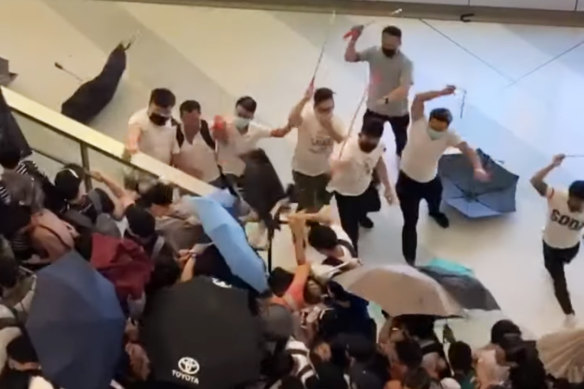 Men wearing white shirts have been filmed attacking protesters in Hong Kong. Vision on social media shows men wielding rods and beating demonstrators at Yuen Long MTR station. 