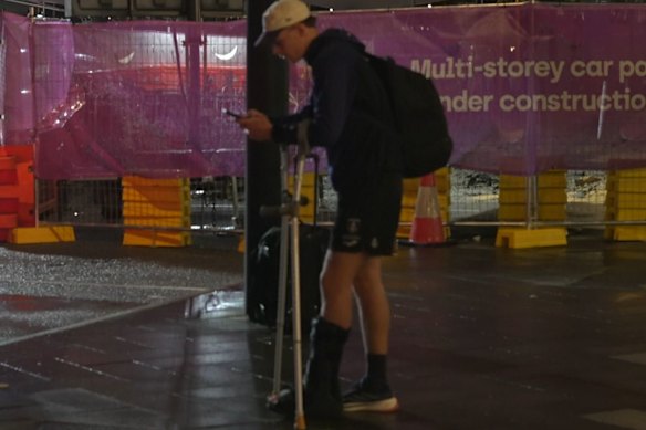Fremantle Docker Matthew Johnson at Perth Airport on Sunday night. 