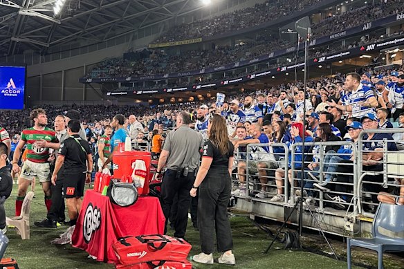 Jai Arrow and Bulldogs fans in heated discussion.