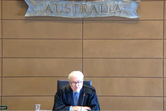 Justice Michael Lee delivering his judgment in court one of the Federal Court in Sydney on Monday.
