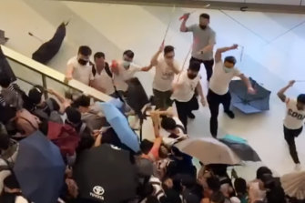 Men wearing white shirts have been filmed attacking protesters in Hong Kong. Vision on social media shows men wielding rods and beating demonstrators at Yuen Long MTR station. 