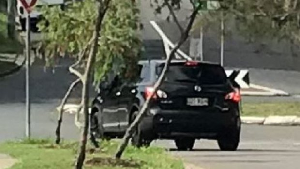 Man punched in the head, kicked on the ground in road rage incident on Brisbane's northside