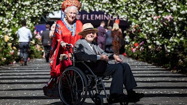 100-year-old Richard Waycott with wife Jane, arrive for the 2021 Melbourne Cup.