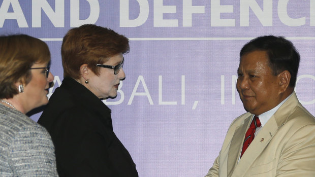 Indonesia's Defence Minister Prabowo Subianto, right, greets Foreign Minsiter Marise Payne and Defence Minister Linda Reynolds, left.