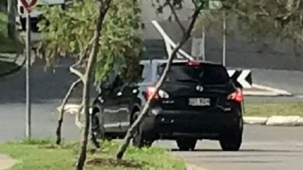 The black SUV involved in a road rage incident at Kedron on Friday.