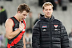 Zach Merrett and Darcy Parish of the Bombers.