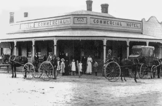 The same building when it was the Commercial Hotel, before 1916, and the town store was in the shop at right.