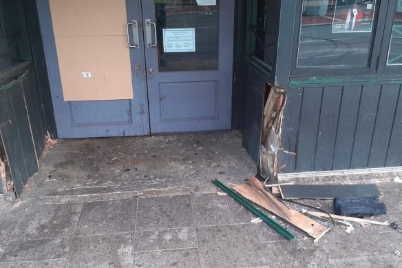 The damaged entry to the bar.