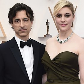 Partners Noah Baumbach, left, and Greta Gerwig arrive at the Oscars in February.