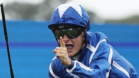Cieren Fallon celebrates on Lake Forest in the Golden Eagle.
