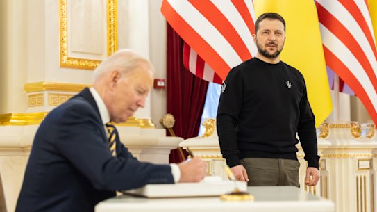KYIV, UKRAINE - FEBRUARY 20: In this handout photo issued by the Ukrainian Presidential Press Office, U.S. President Joe Biden signs the guest book during a meeting with Ukrainian President Volodymyr Zelensky at the Ukrainian presidential palace on February 20, 2023 in Kyiv, Ukraine. The US President made his first visit to Kyiv since Russia’s large-scale invasion last February 24. (Photo by Ukrainian Presidential Press Office via Getty Images) Biden and Zelensky