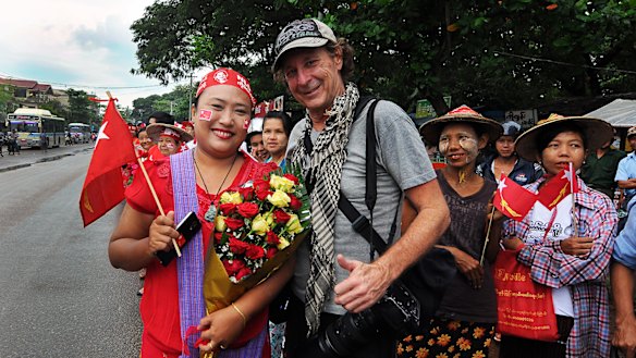 Tickner covering a political rally for Aung San Suu Kyi in 2015.
