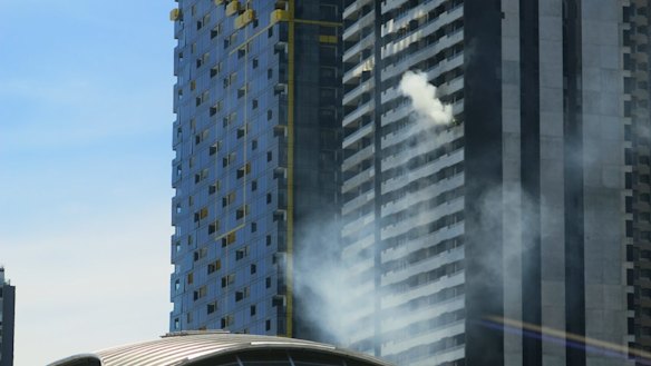 Smoke billowing from the same apartment building in Spencer Street in 2015. 