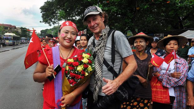 Tickner covering a political rally for Aung San Suu Kyi in 2015.