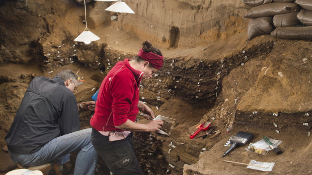 Researchers in the interior of the Blombos cave east of Cape Town, South Africa. 