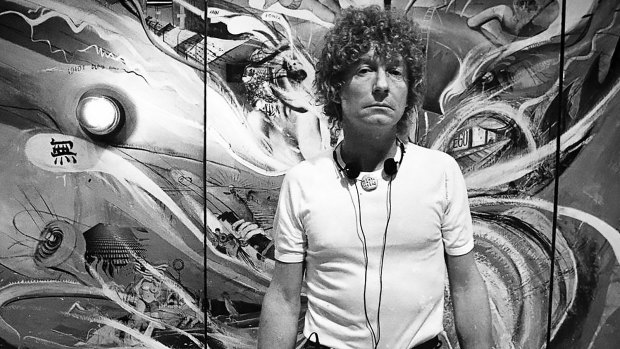 Brett Whiteley pictured in front of The American
Dream at Art Gallery of Western Australia, 1983.