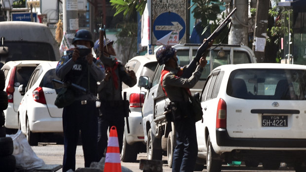 Police seek out anti-government demonstrators following the coup.