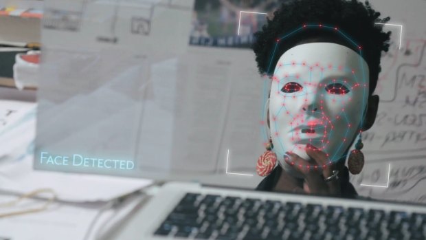 Only when Joy Buolamwini donned a white mask did the algorithm recognise her face.