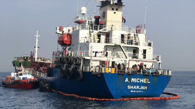 The damaged Emirati-flagged bunkering tanker A Michel off the coast of Fujairah, UAE.