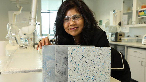 Professor Veena Sahajwalla with a display of the new building materials produced by the University of NSW from old clothing waste. 
