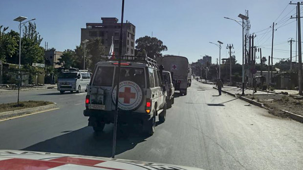 Vehicles of the International Committee of the Red Cross (ICRC) drive along a street during a mission to deliver medical assistance to the region's main hospital in Mekele, capital of the Tigray region, in Ethiopia, last month.