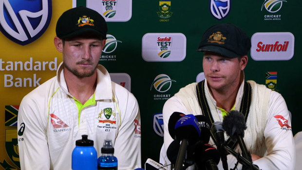 No one's laughing now: Cameron Bancroft (left) and Steve Smith during their infamous press conference in Cape Town. 