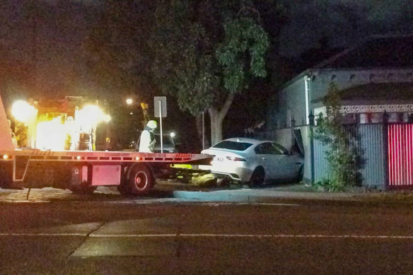 A tow truck collects Tim Smith’s crashed  Jaguar in 2021.