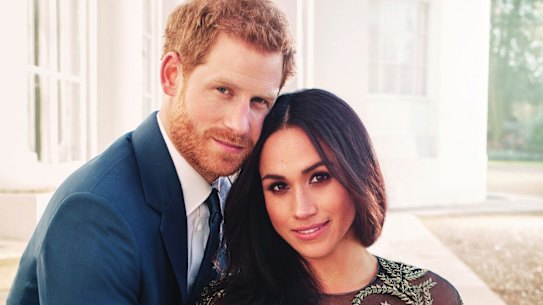 Prince Harry and Meghan Markle pose for one of two official engagement photos. 