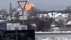 Video show flames rising from the scene of a warplane crashed at a residential area near Yablonovo, Belgorod region.