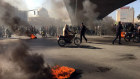 Protesters block a highway in Isfahan, Iran, on Saturday following a fuel price increase.