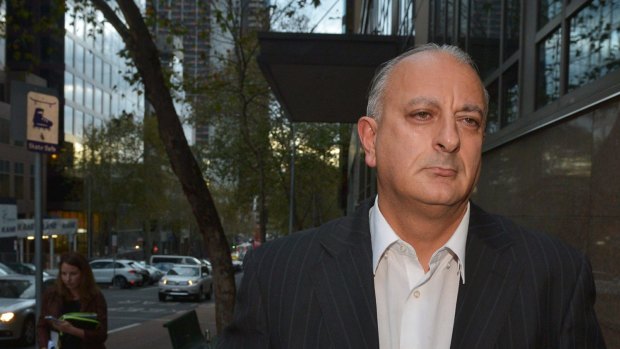 Former professional poker player Bill Jordanou leaves court in 2014.