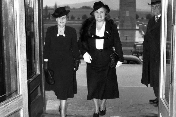 The iconic photo of Dame Dorothy Tangney (left) and Dame Enid Lyons entering Parliament House on September 24, 1943. A bronze statue, by sculptor Lis Johnson, replicating this photo will be unveiled in the parliamentary triangle in Canberra on Wednesday.