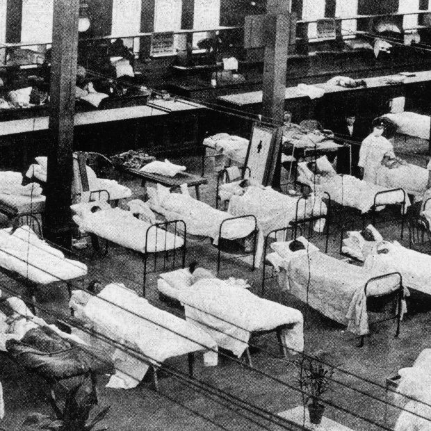 Hospital beds in the Great Hall of the Exhibition Building during the Spanish flu pandemic.