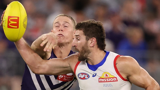 AFL LIVE: Dockers dump Dogs with decisive last term; Geelong celebrate big win and Cameron’s 600th goal