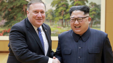US. Secretary of State Mike Pompeo, left, shakes hands with North Korean leader Kim Jong-un in May.