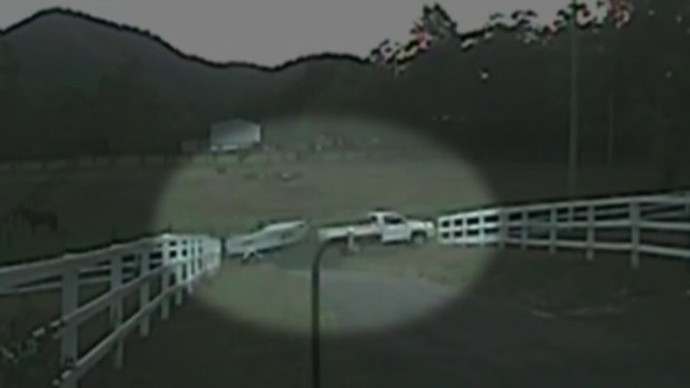 The ute captured on CCTV moments before the boat and trailer it was towing were set alight.