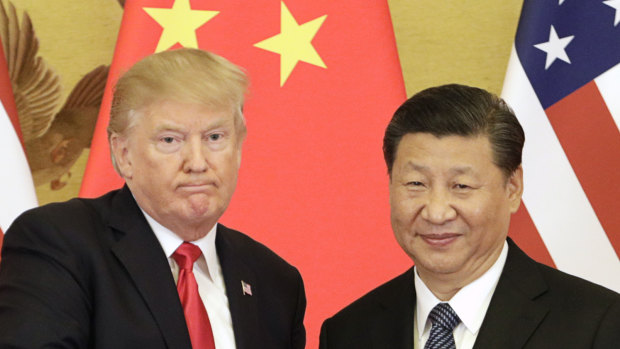 US President Donald Trump, left, and China's President Xi Jinping have clashed over an increasing trade war.