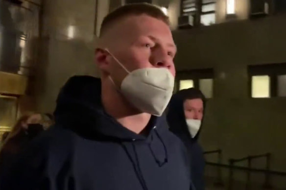 Collingwood star Jordan De Goey leaves a New York court after he was earlier arrested earlier.