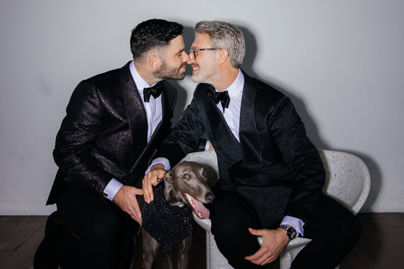 David Bottrall (left) and Will Fennell matched their wedding day attire with their dog, Henri.